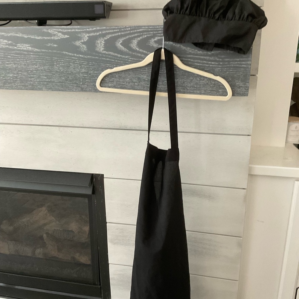 Black apron and chef hat